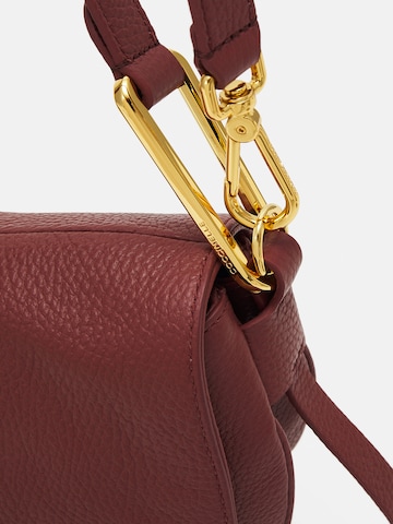 Geantă de umăr 'MAGIE SOFT' de la Coccinelle pe roșu