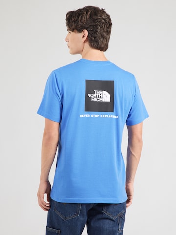 THE NORTH FACE Тениска 'EVOLUTION BOX NSE' в синьо: отпред
