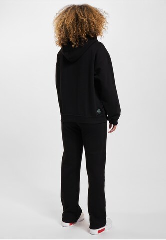 ROCAWEAR Joggingpak in Zwart