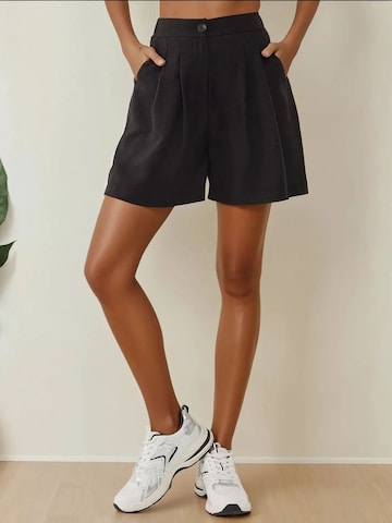 Pantalon à pince Hiccup en noir : devant