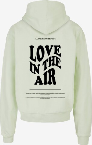 Merchcode Sweatshirt 'Love In The Air' in Grün