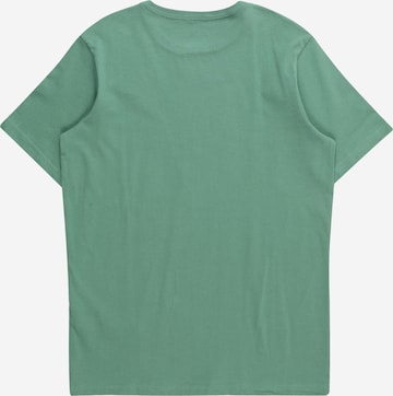 Tricou funcțional 'YOUTH' de la QUIKSILVER pe verde