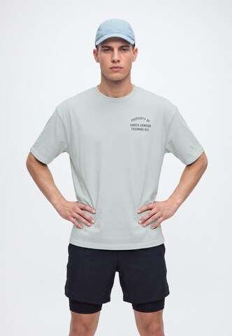 UNDER ARMOUR - Camiseta funcional 'PROPERTY OF UA' en gris