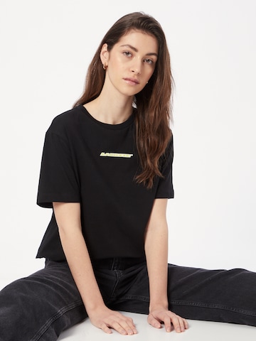 LACOSTE - Camiseta en negro: frente