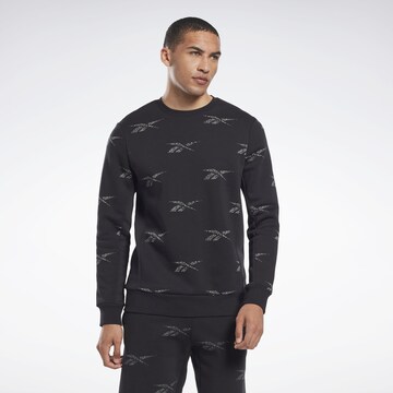 Reebok - Sweatshirt de desporto 'Identity Vector' em preto: frente