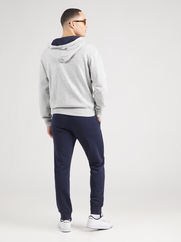 Tuta da jogging di Champion Authentic Athletic Apparel in grigio