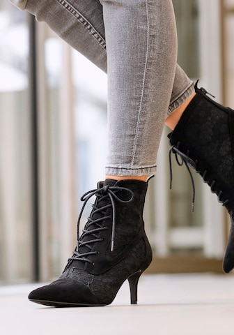 LASCANA Lace-Up Ankle Boots in Black: front