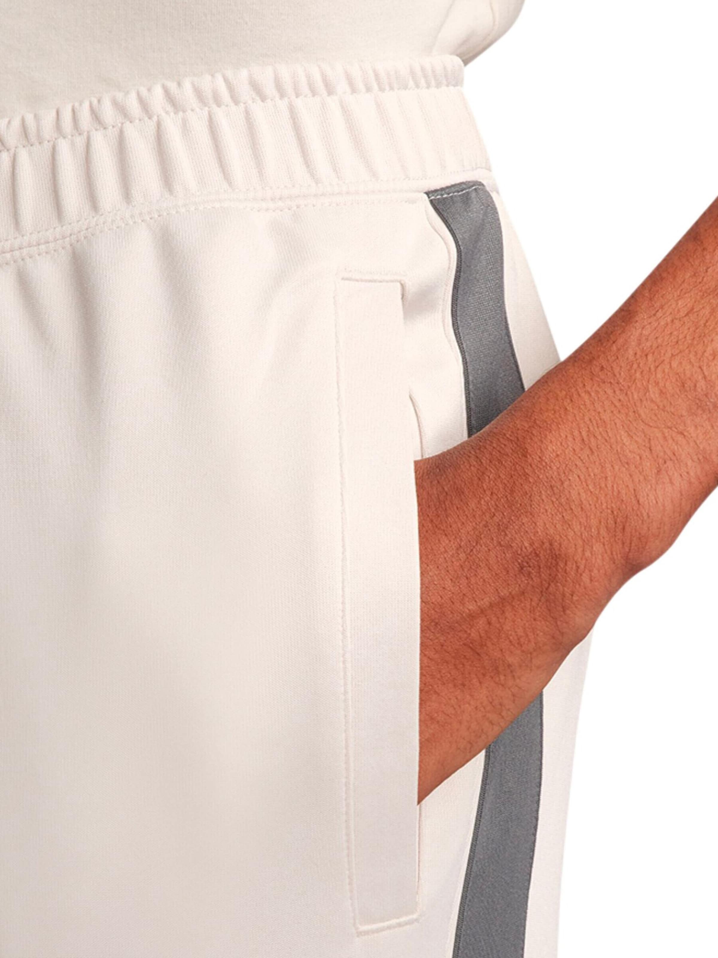 Tapered Pantaloni 'Air' di Nike Sportswear in beige