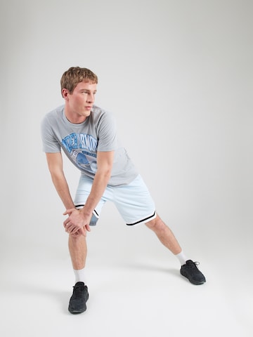 Tricou funcțional 'VARSITY CREST' de la UNDER ARMOUR pe gri