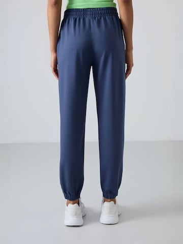 Tommy Life Tapered Broek 'Jogginghose' in Blauw