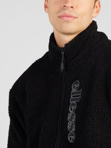 ELLESSE Between-Season Jacket 'Alpora' in Black