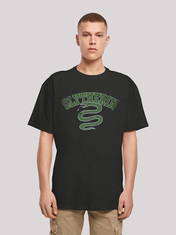 F4NT4STIC Shirt 'Harry Potter Slytherin Sport Emblem' in Zwart: voorkant