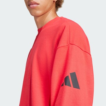 ADIDAS SPORTSWEAR Sports sweatshirt 'Essentials' in Red