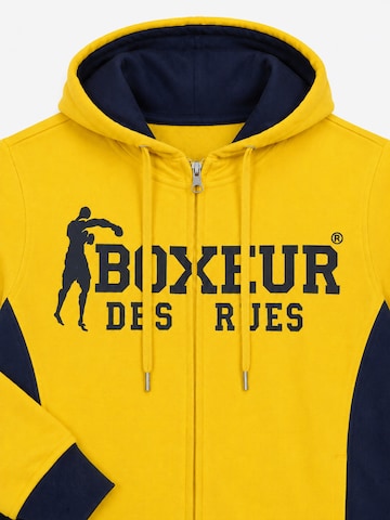 Boxeur des Rues - Sudadera 'Herren Hoodie Fitted Boxeur des Rues mit Reißverschluss und Kapuze, Gelb mit Marineblau, Baumwolle' en amarillo