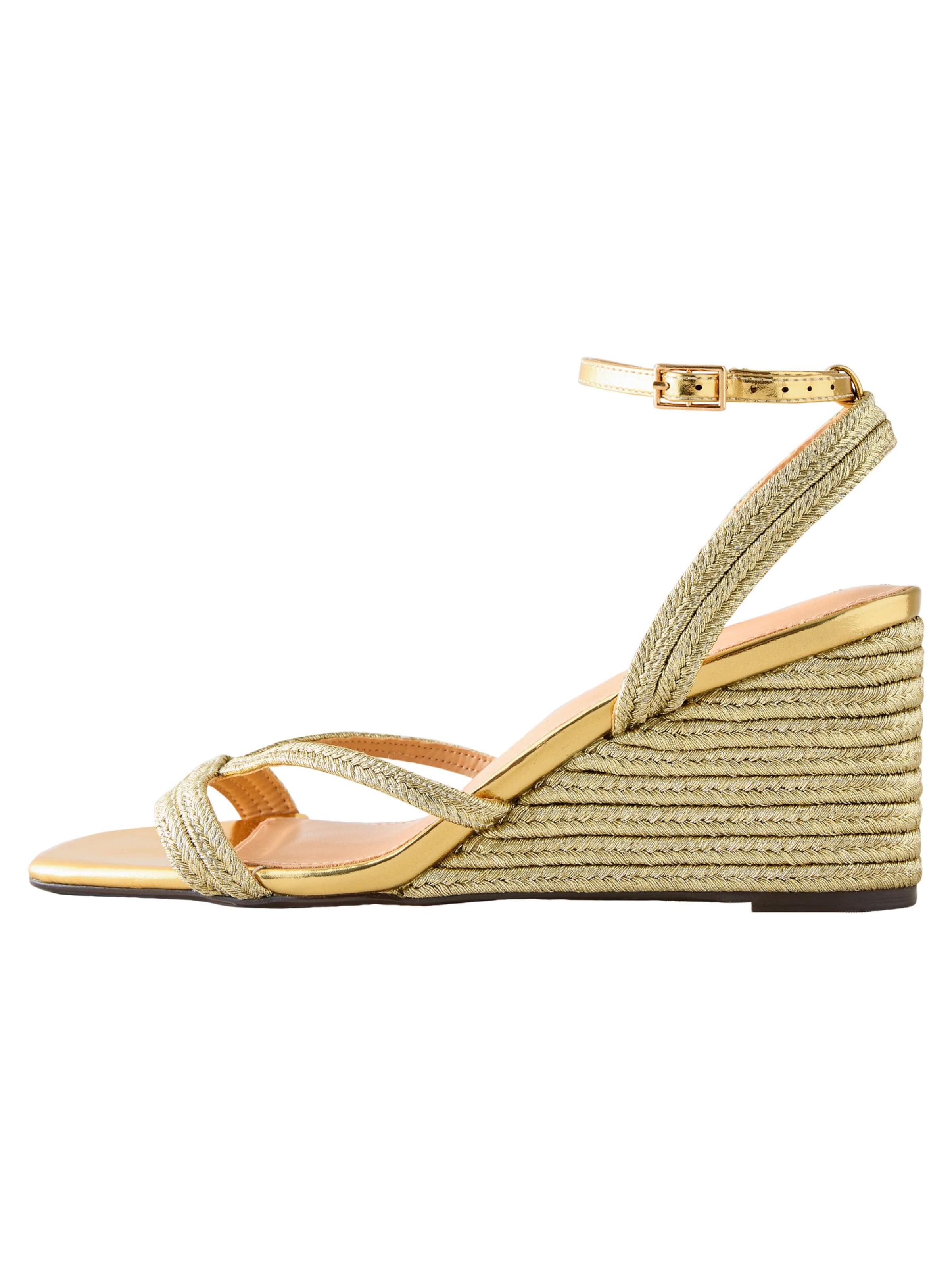 Next Sandaler i guld: forside