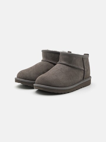 Bocanci de zăpadă 'CLASSIC ULTRA MINI' de la UGG pe gri