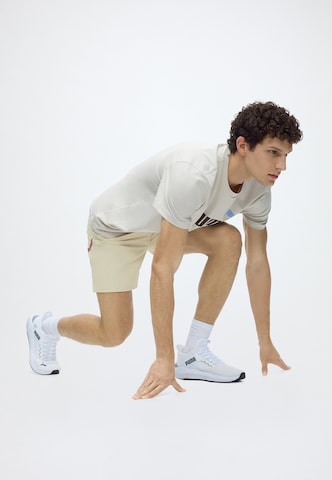 PUMA Szabványos Sportnadrágok 'Promo' - bézs