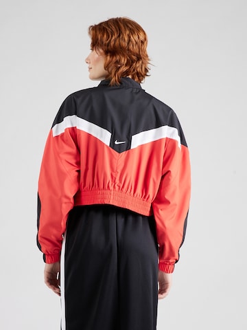 Nike Sportswear Prehodna jakna | rdeča barva