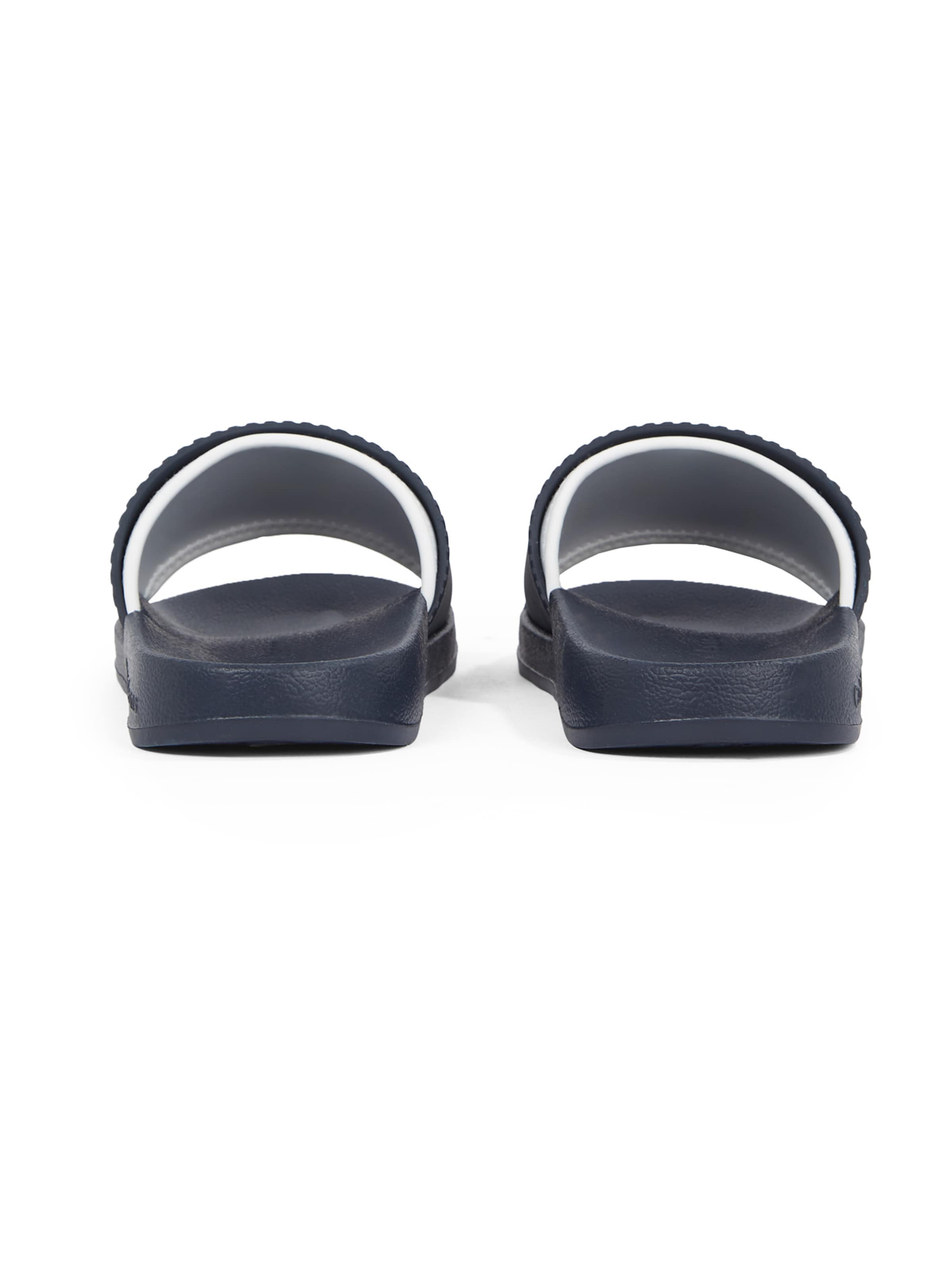 Saboți de la Calvin Klein pe albastru