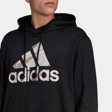 ADIDAS SPORTSWEAR Sportsweatshirt 'Essentials French Terry Camo-Print' in Schwarz