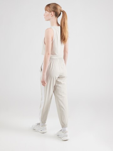 ADIDAS PERFORMANCE Tapered Sports trousers 'Essentials' in Beige