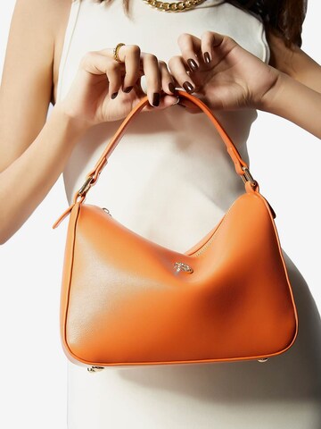 Victoria Hyde Handbag in Orange: front