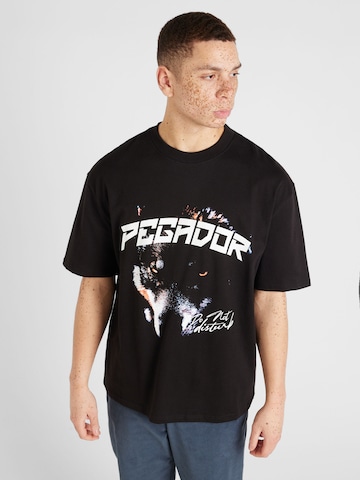 Pegador T-shirt 'DONORA' i svart: framsida