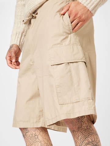 Loosefit Pantaloni cargo di WEEKDAY in beige