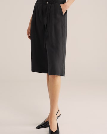 WE Fashion Wide Leg Bukser med lægfolder i sort: forside