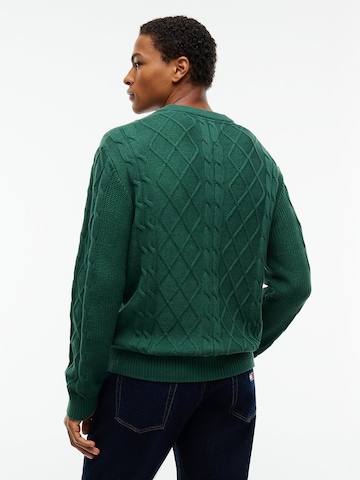 Pull-over Tommy Jeans en vert