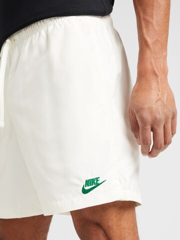 Nike Sportswear Štandardný strih Nohavice - Béžová