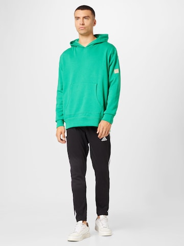 ADIDAS GOLF - Sweatshirt de desporto em verde