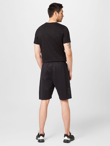 Regular Pantalon de sport Hummel en noir