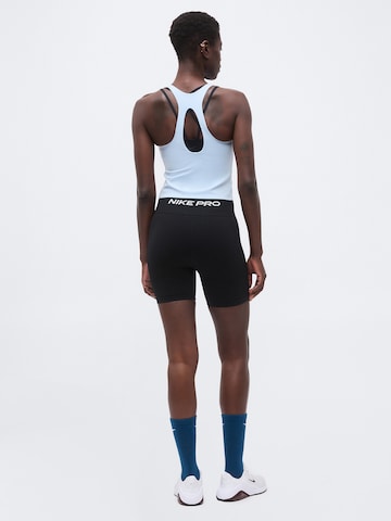 Skinny Pantaloni sport 'Seamless' de la NIKE pe negru