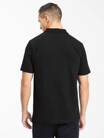 T-Shirt fonctionnel 'TeamGoal 23' PUMA en noir
