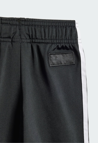 Survêtement 'Disney  Firebird' ADIDAS ORIGINALS en noir