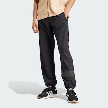 Tapered Pantaloni di ADIDAS ORIGINALS in nero: frontale