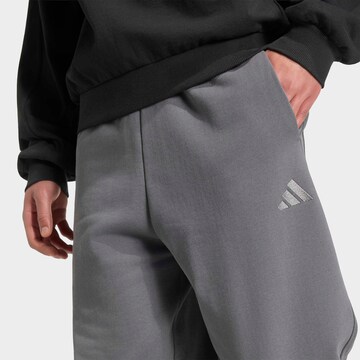 ADIDAS SPORTSWEAR Tapered Workout Pants in Green