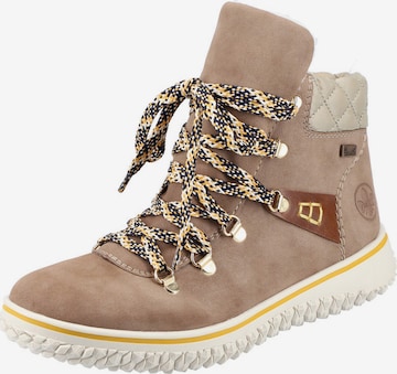 Bottines à lacets Rieker en beige : devant