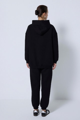 Touche Prive Jogginganzug in Schwarz