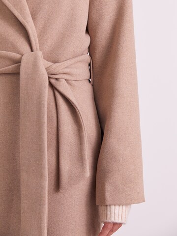 ABOUT YOU x Iconic by Tatiana Kucharova Between-Seasons Coat 'Livia' in Beige