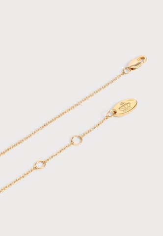 Juicy Couture Řetízek 'Crystal Heart Small Pendant' – zlatá