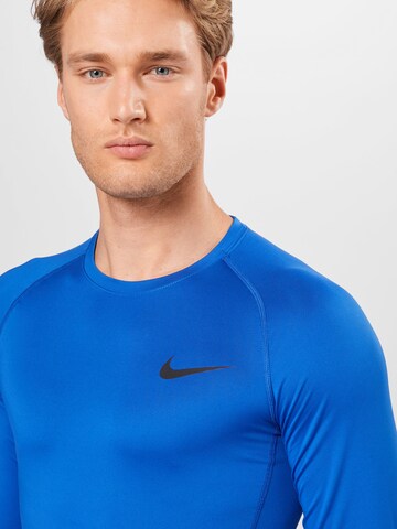 Coupe regular Base Layer NIKE en bleu