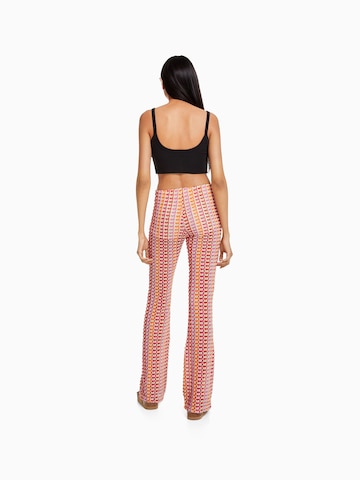 Bershka Flared Trousers in Red