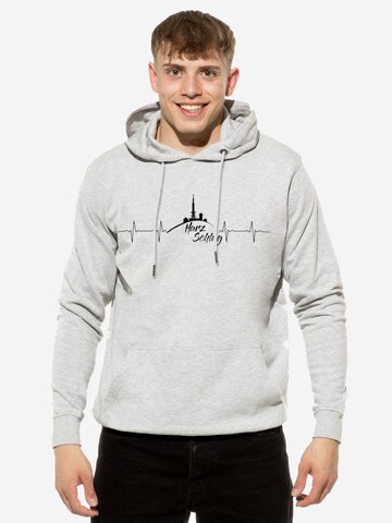 Cotton Prime Sweatshirt 'Harzschlag' in Grijs: voorkant