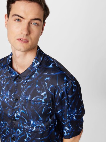 Han Kjøbenhavn - Regular Fit Camisa em azul