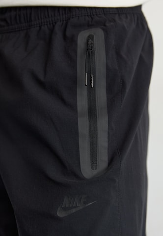 Nike Sportswear Tapered Byxa i svart