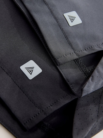 Next regular Bukser i grå