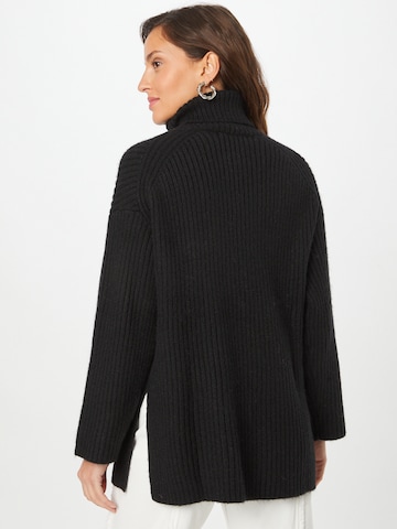 ABOUT YOU Sweater 'Caya' in Black