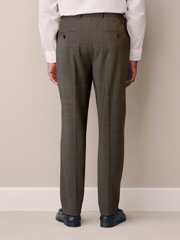 regular Pantaloni con piega frontale 'Motionflex' di Next in marrone